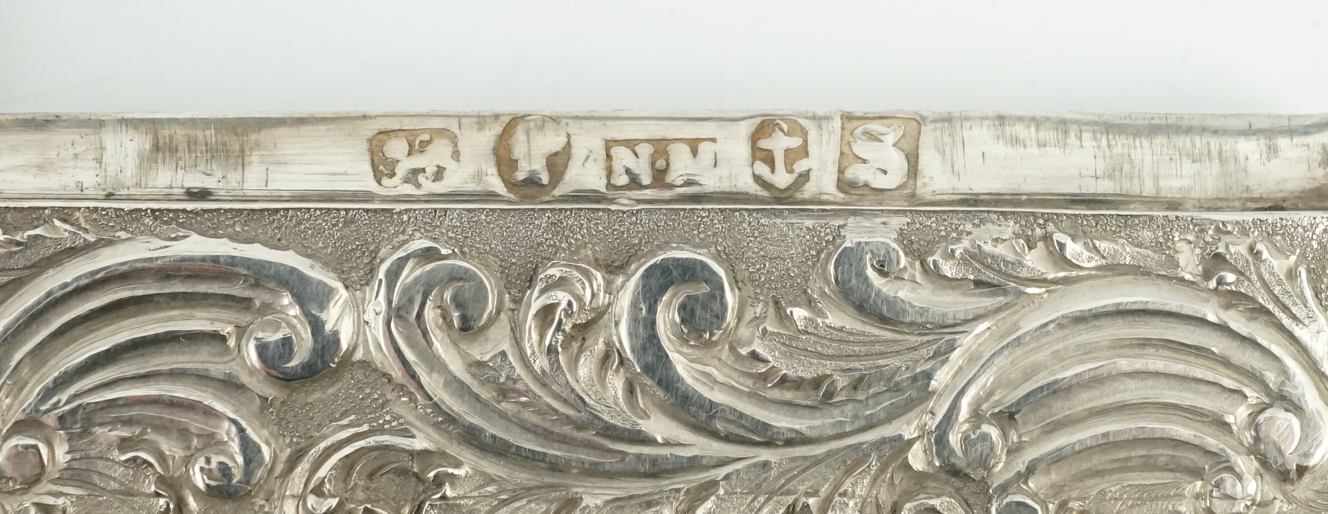 An early Victorian silver 'castle top' card case by Nathaniel Mills, depicting Windsor and Warwick castles, in fitted case